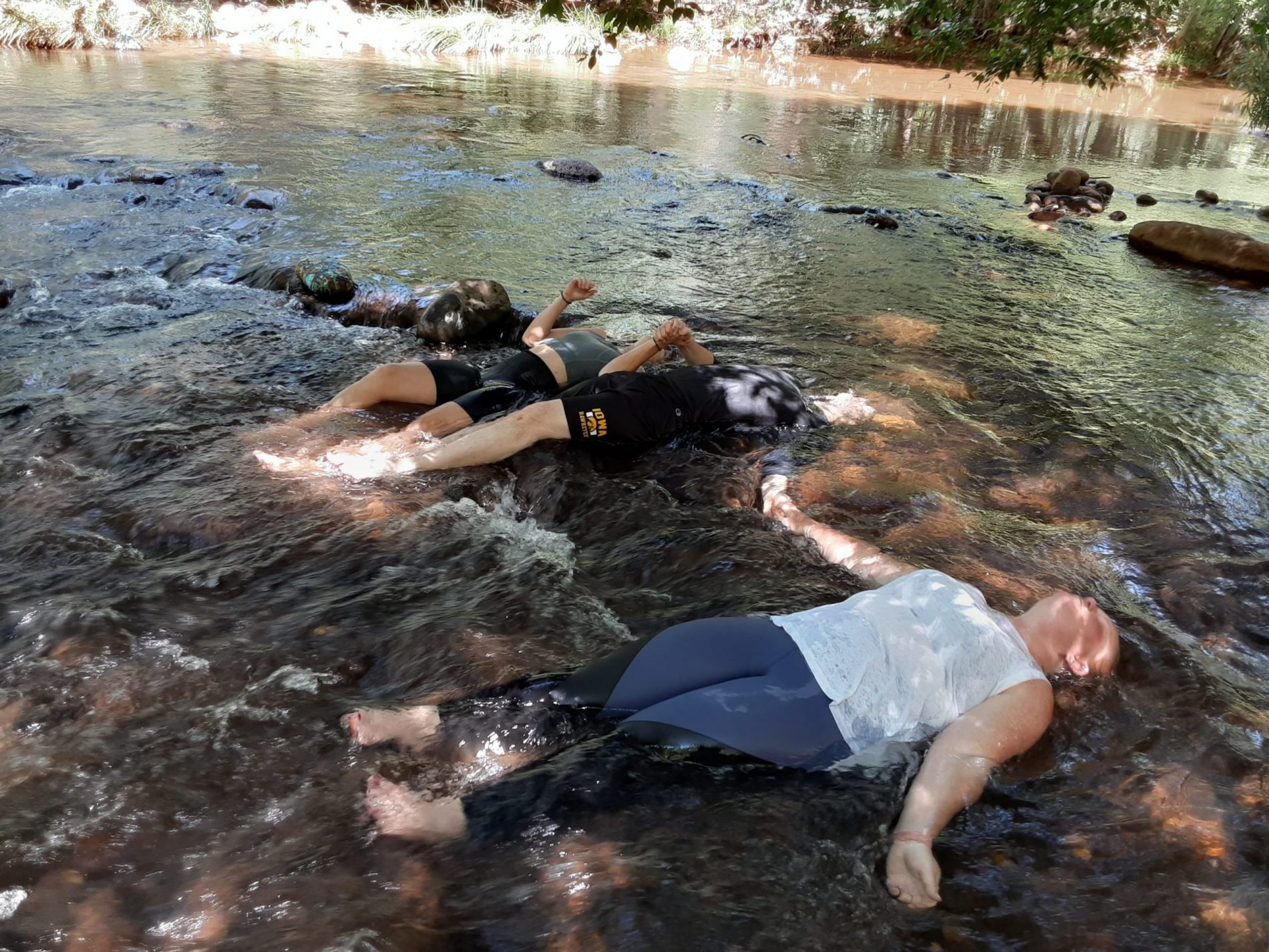 laying down in creek